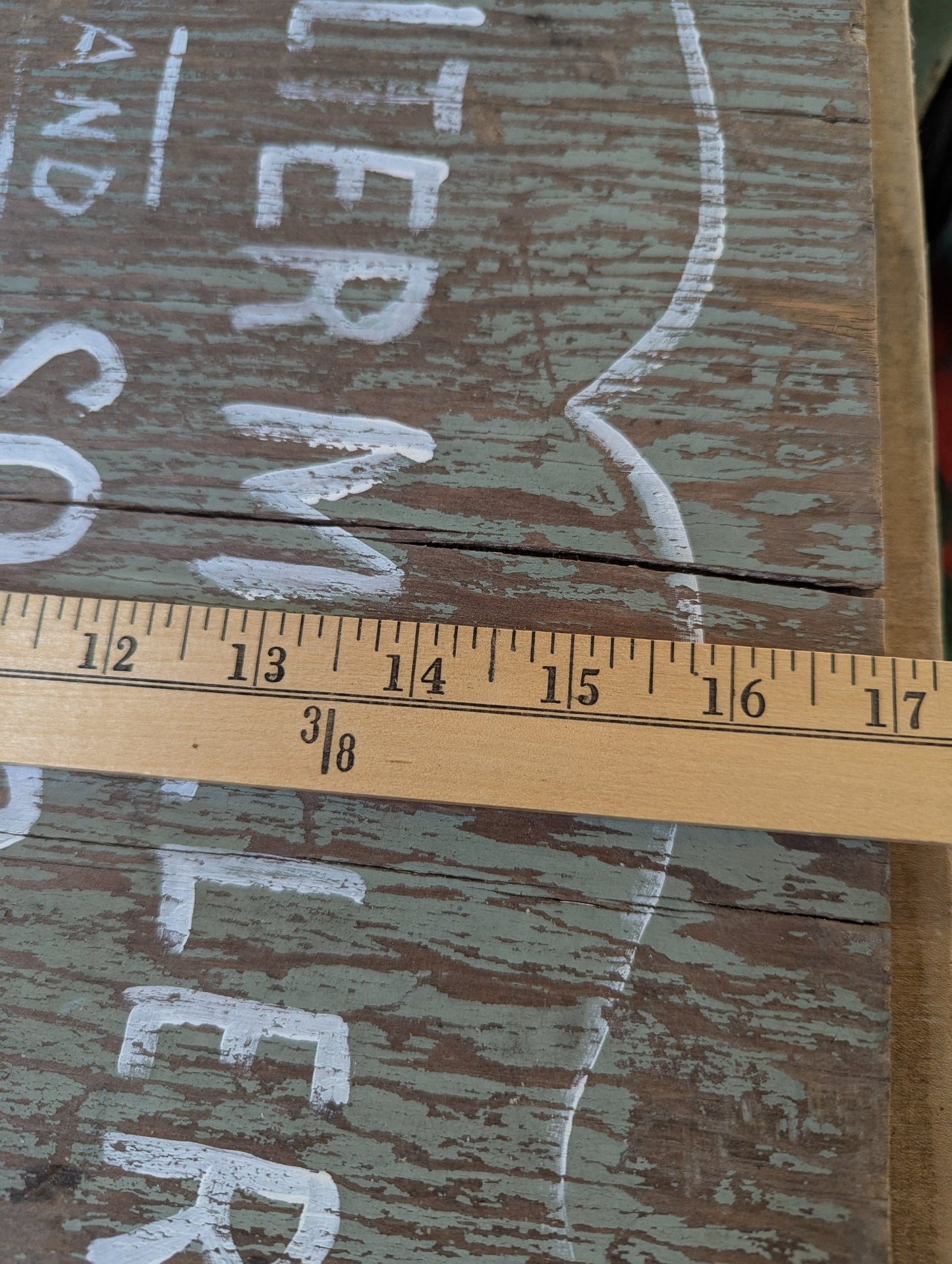 Wood door repurposed sign