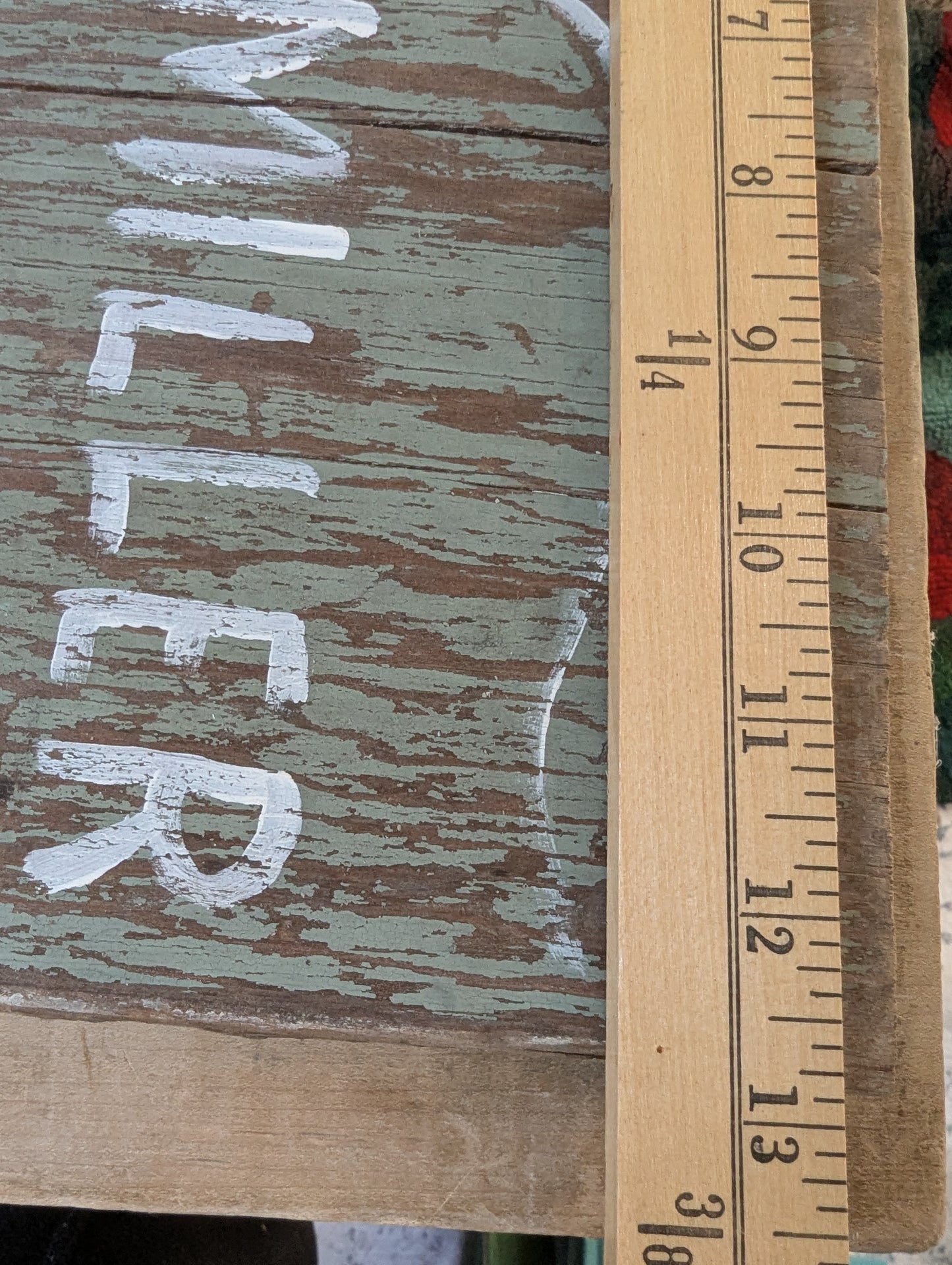 Wood door repurposed sign