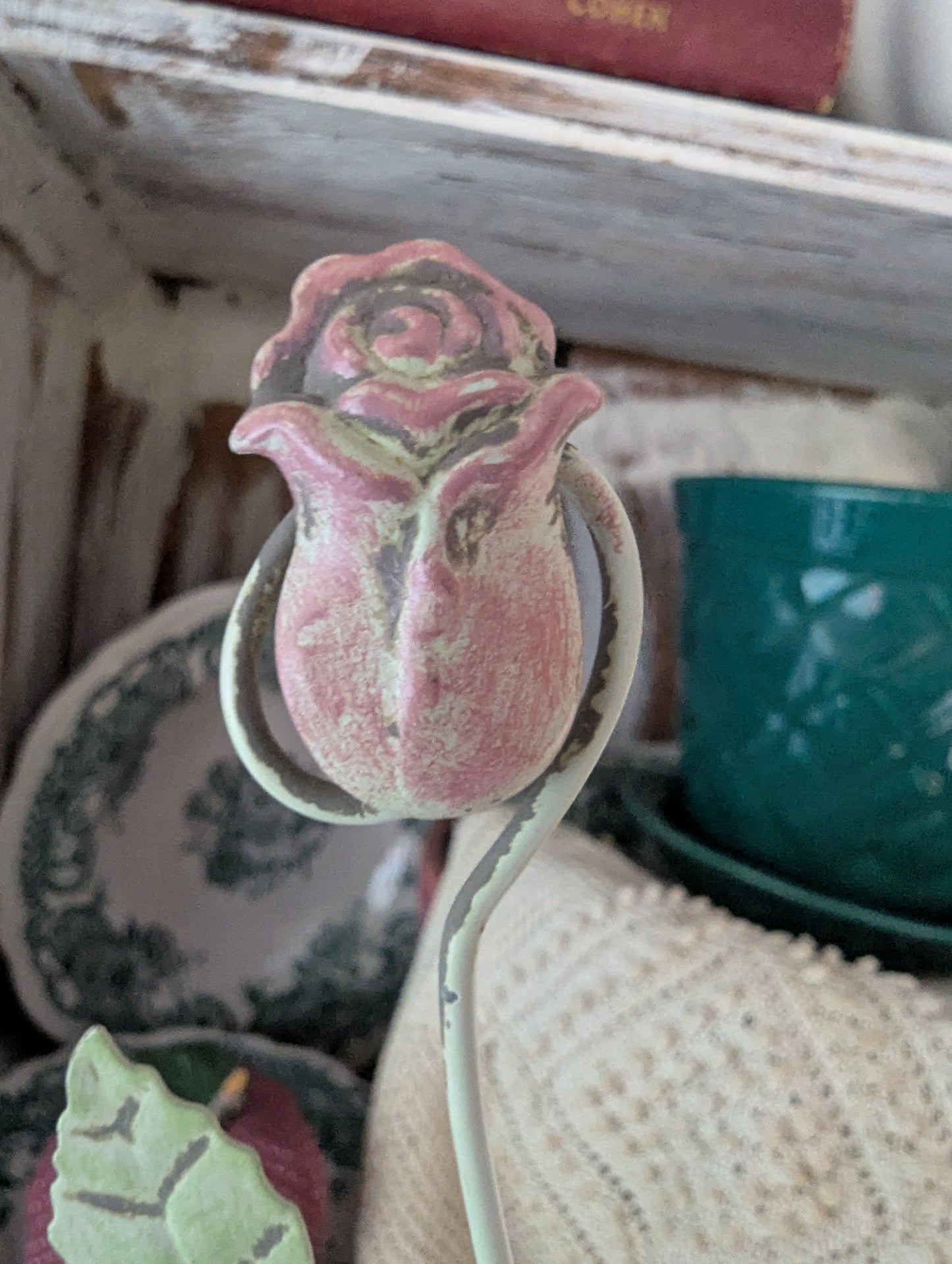 Postcard ephemera display with roses