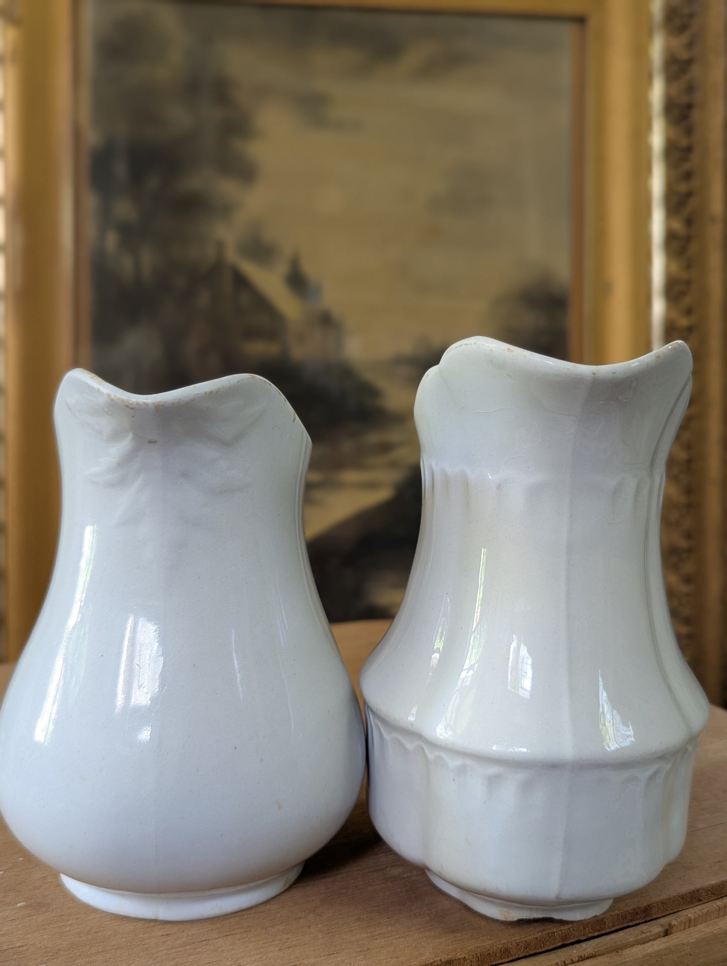Pair of ironstone pitchers/creamers