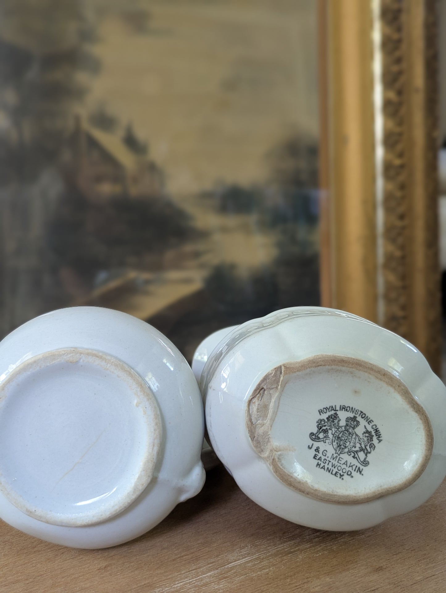Pair of ironstone pitchers/creamers