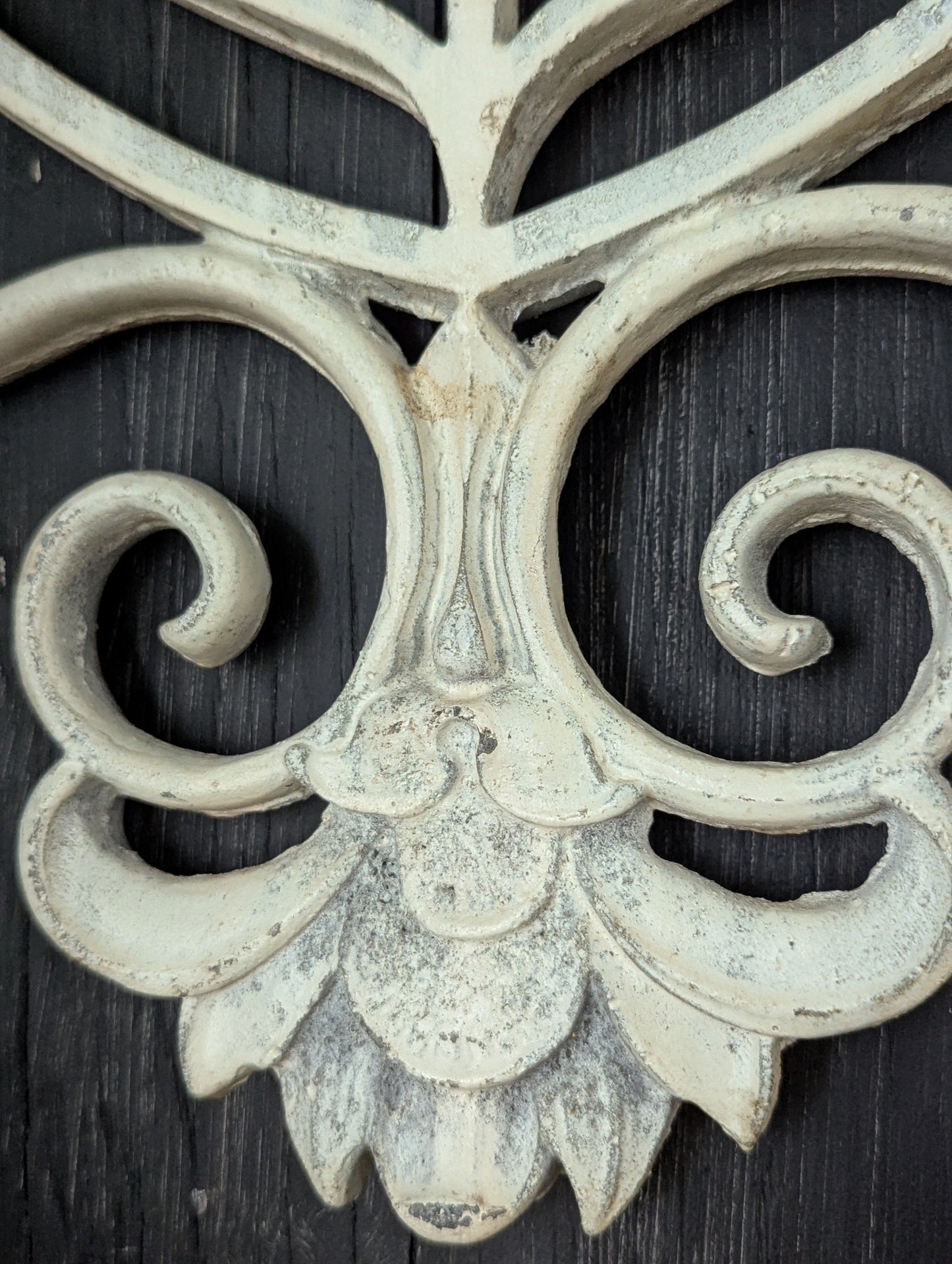 White cast metal wall decor