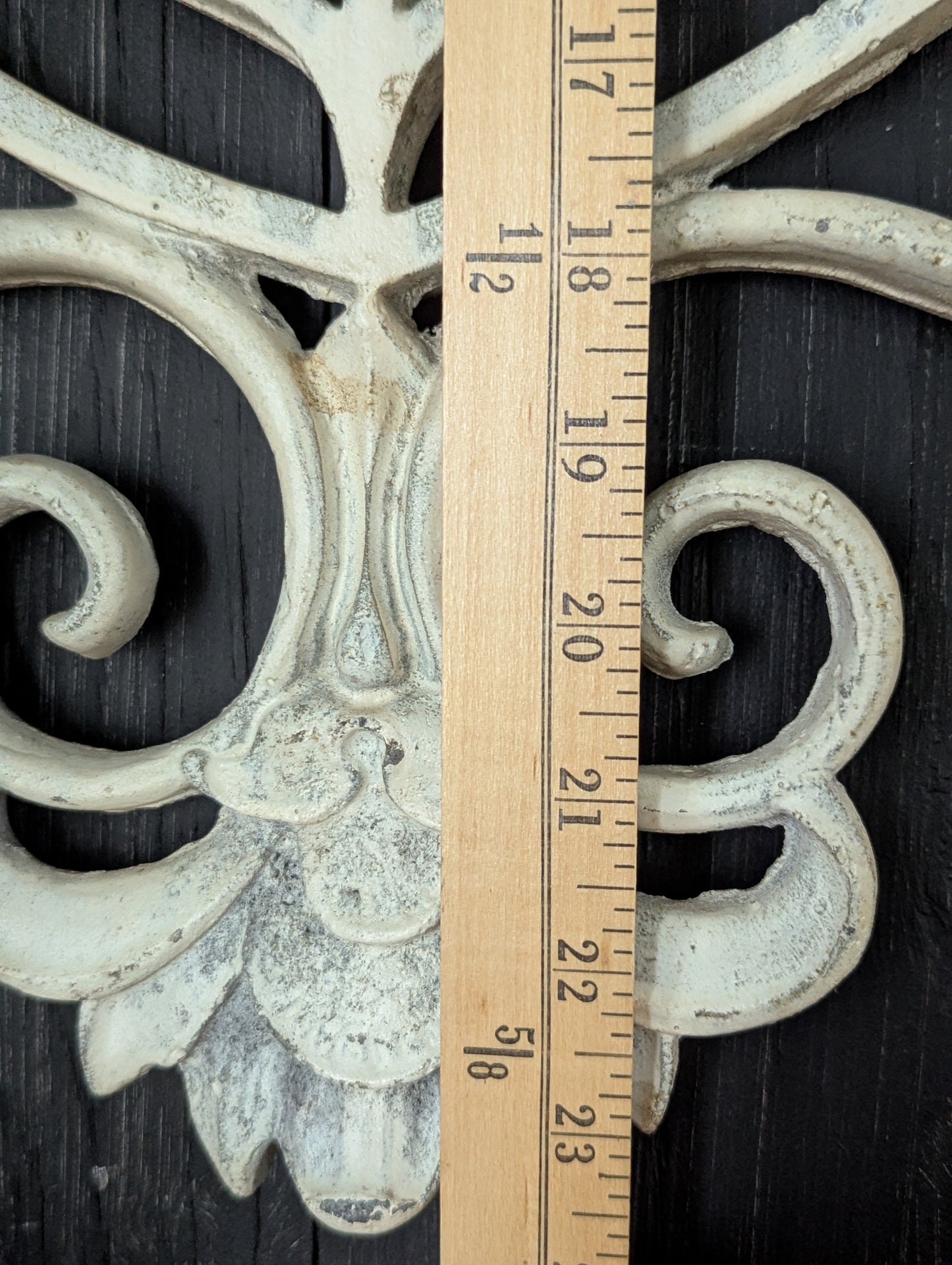White cast metal wall decor