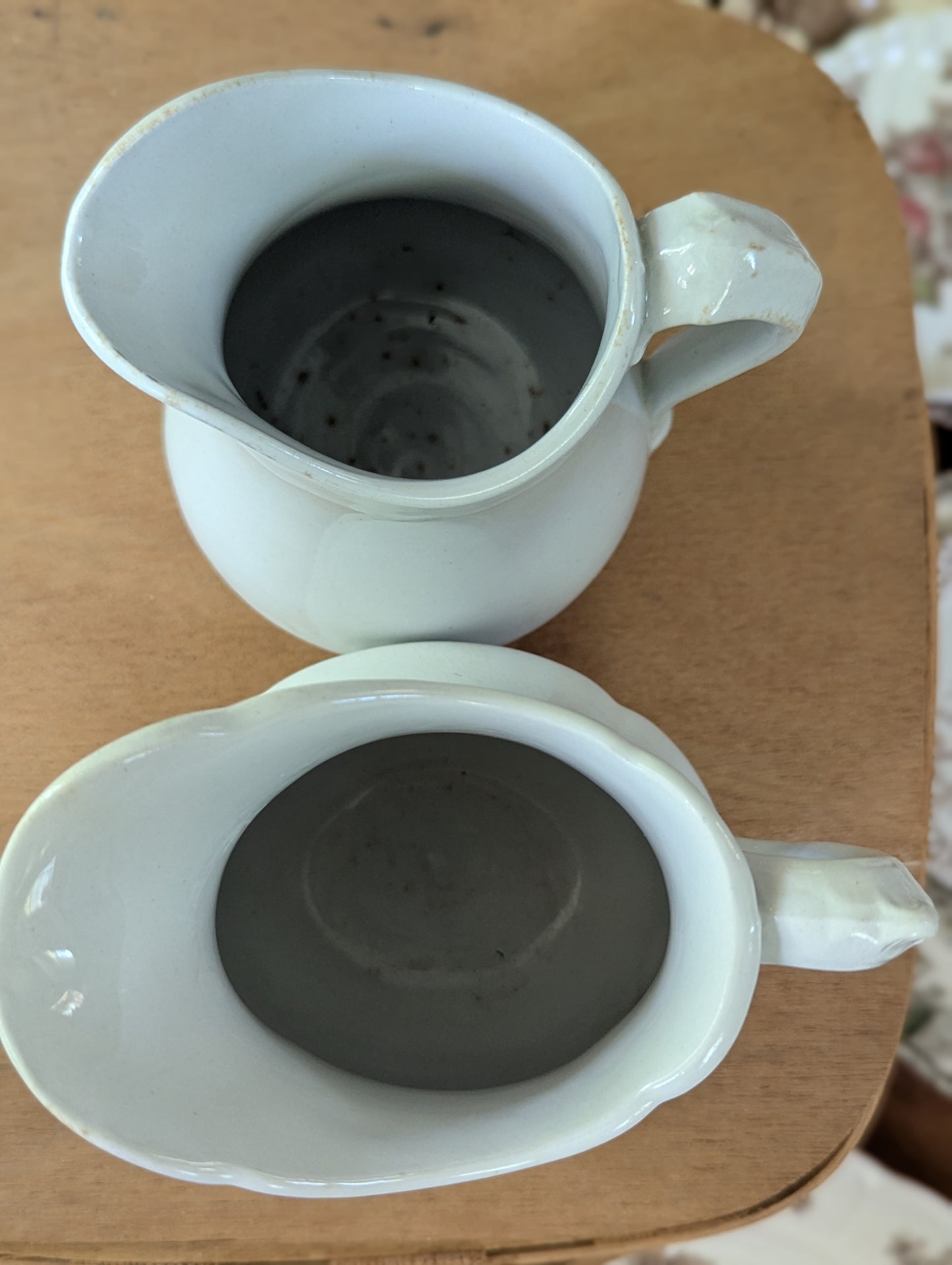 Pair of ironstone pitchers/creamers