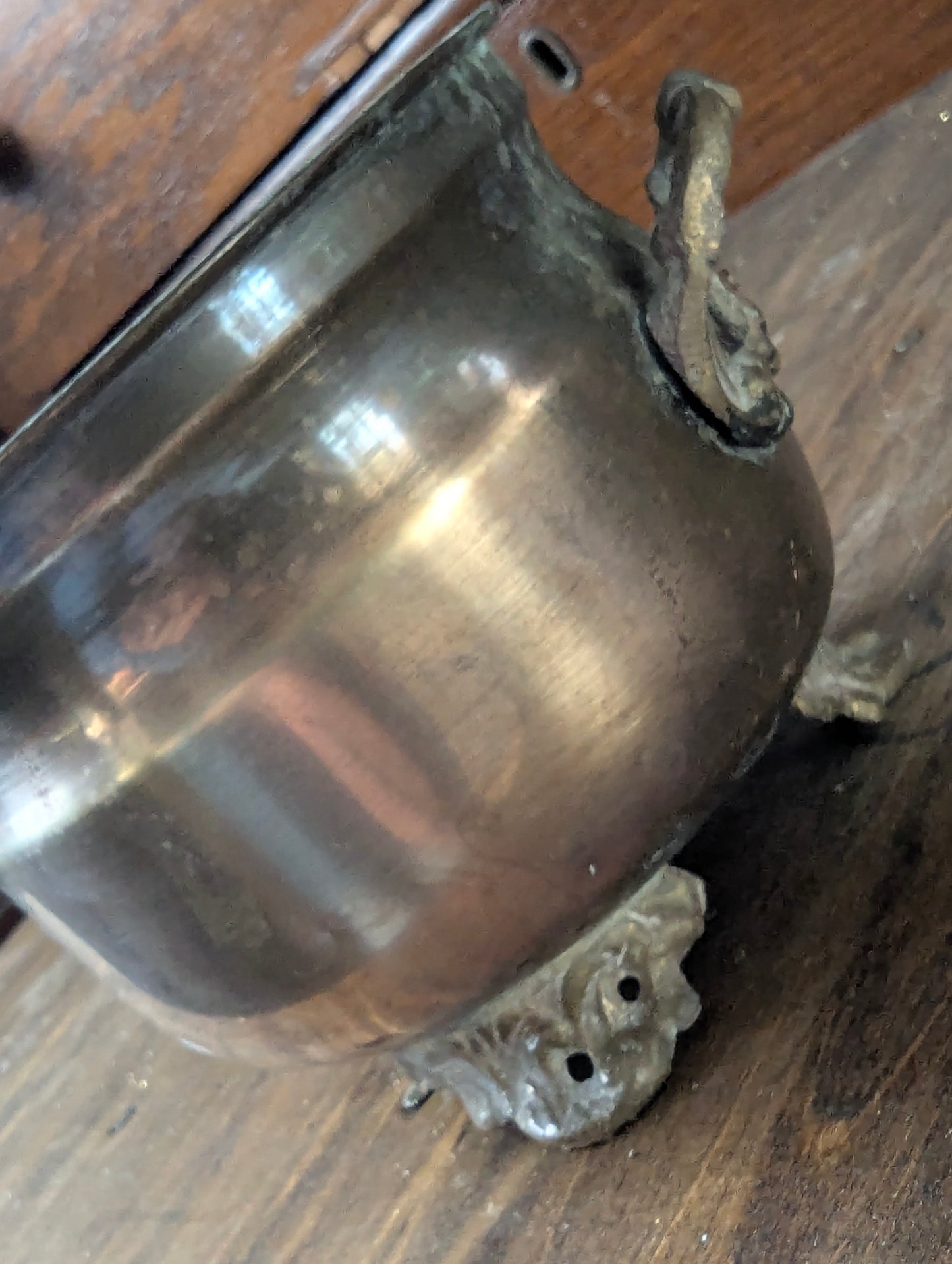 Brass footed planter pot