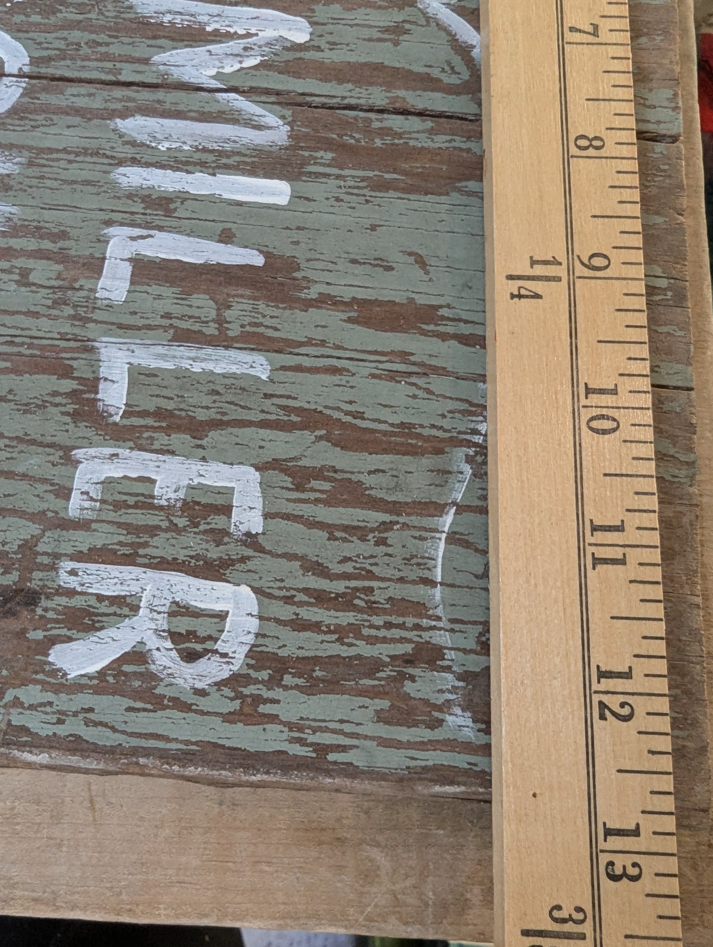 Wood door repurposed sign