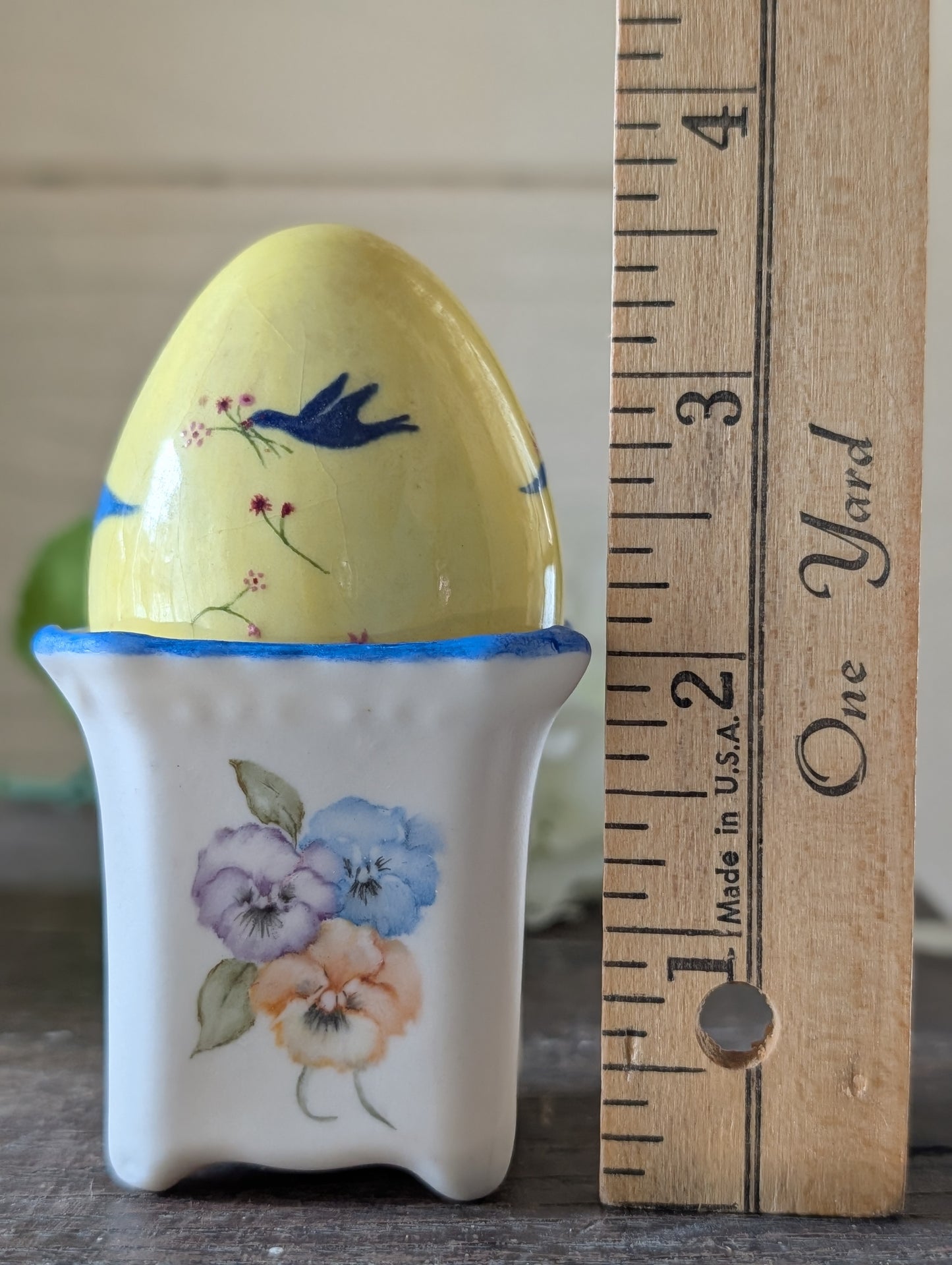Mini pot with bluebird egg
