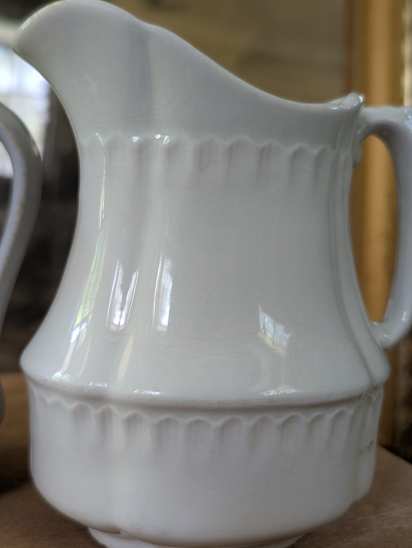 Pair of ironstone pitchers/creamers