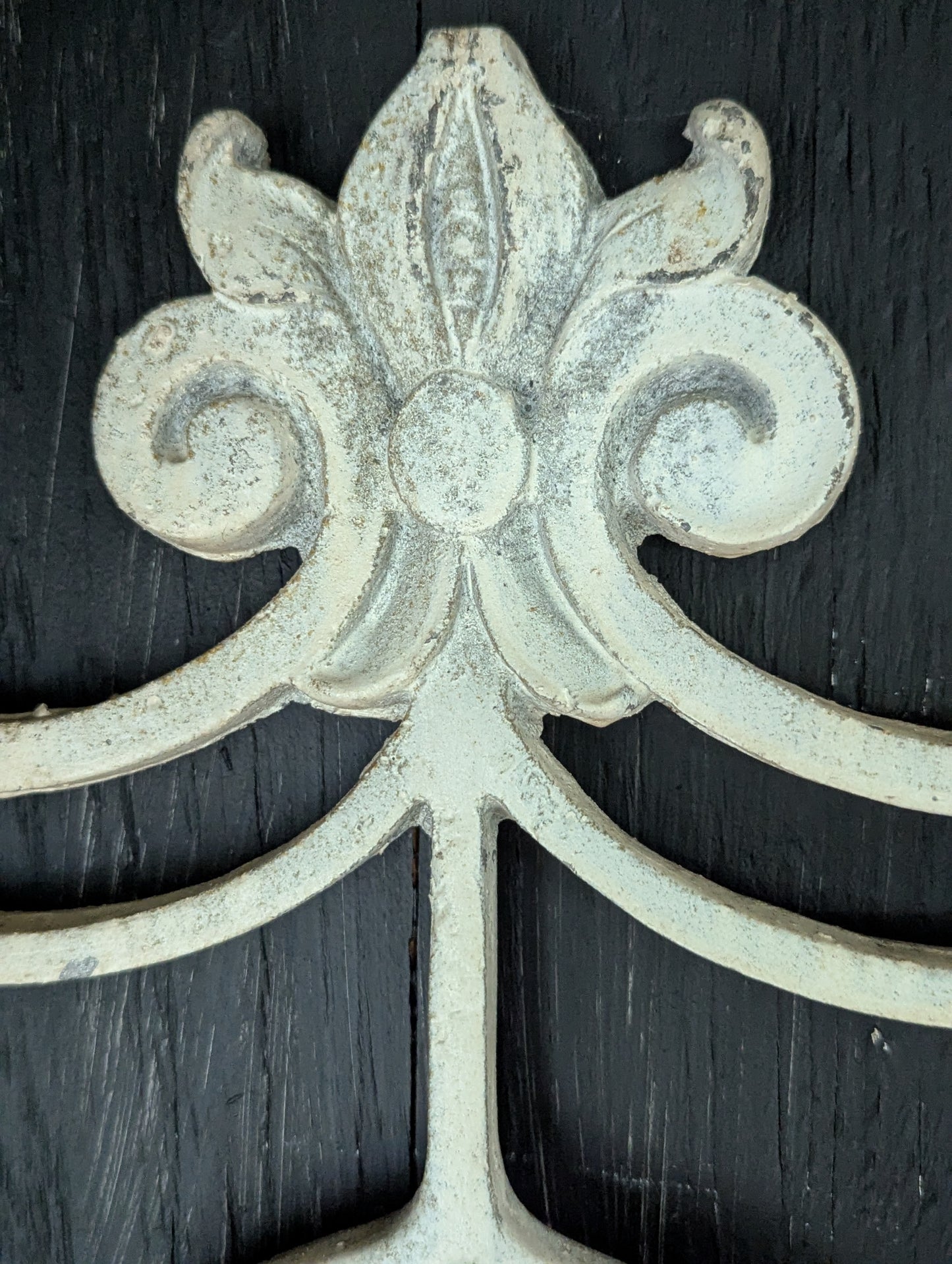 White cast metal wall decor