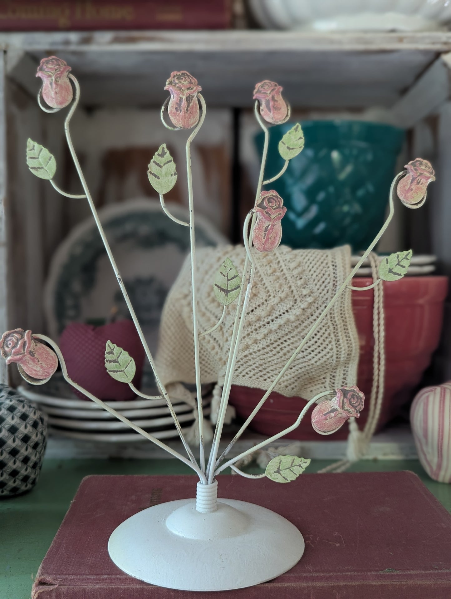 Postcard ephemera display with roses
