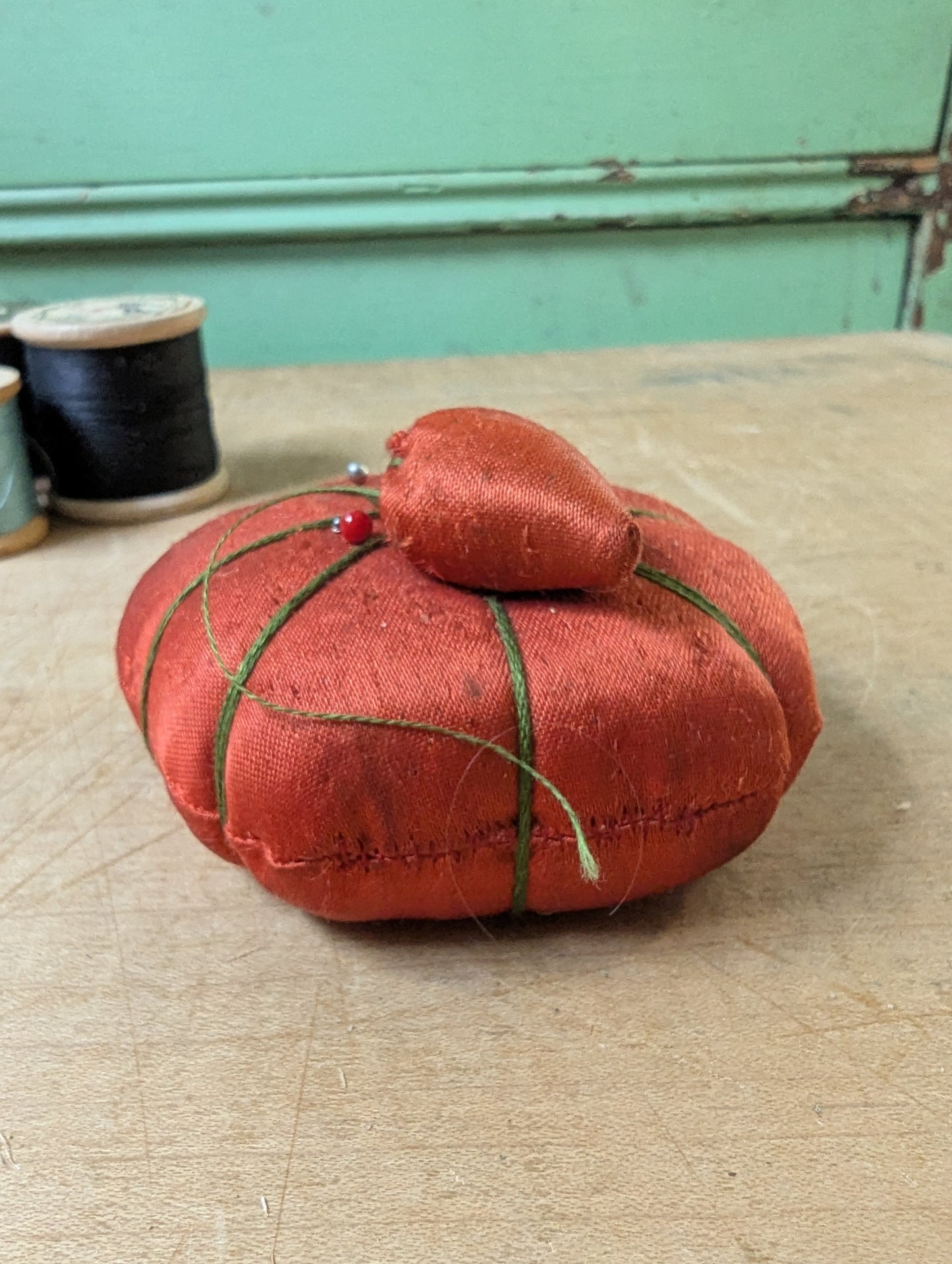 Satin tomato pin cushion