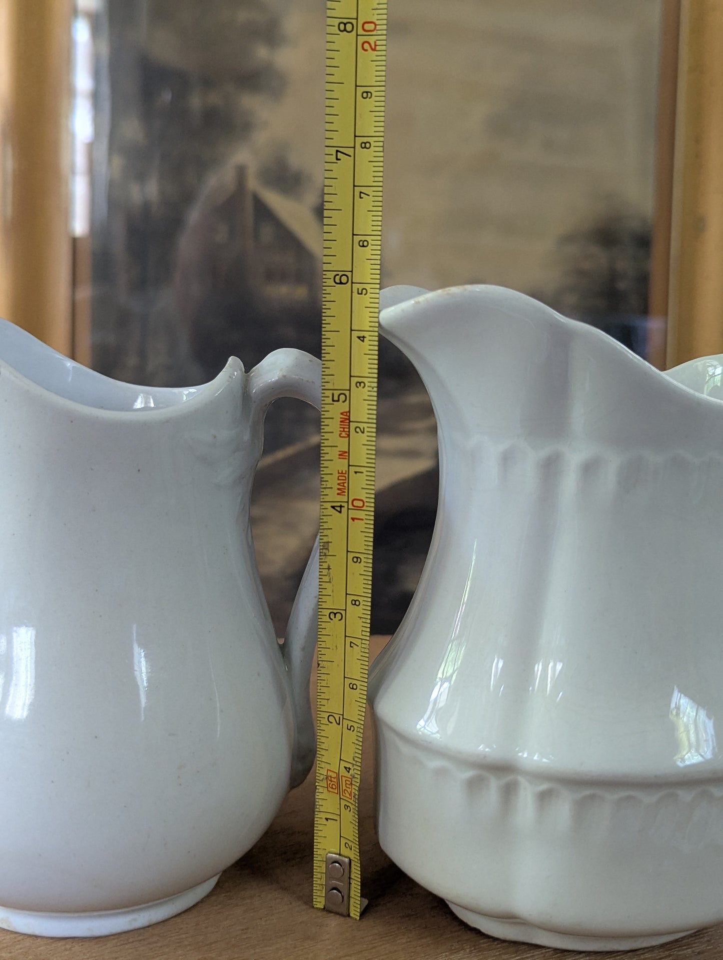 Pair of ironstone pitchers/creamers