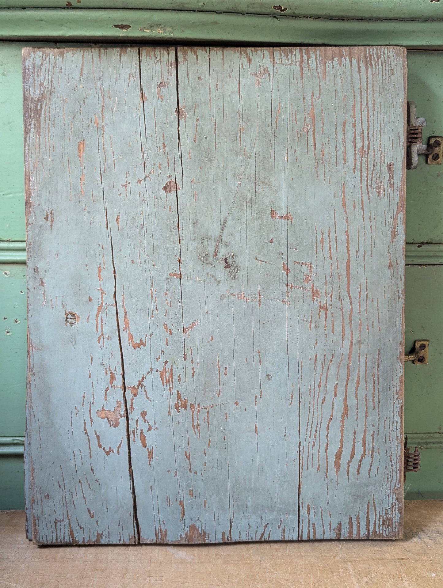 Wood door repurposed sign