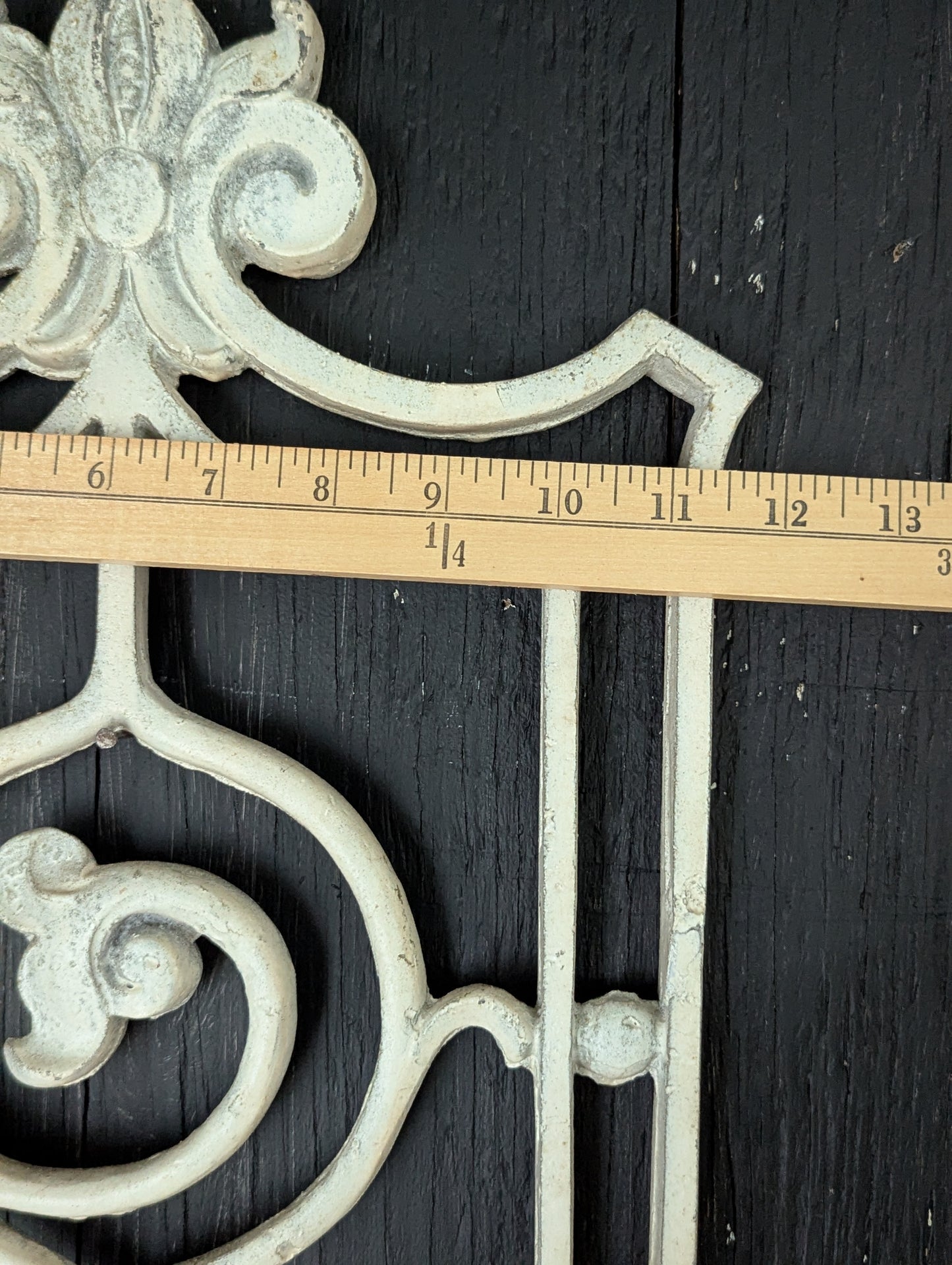 White cast metal wall decor