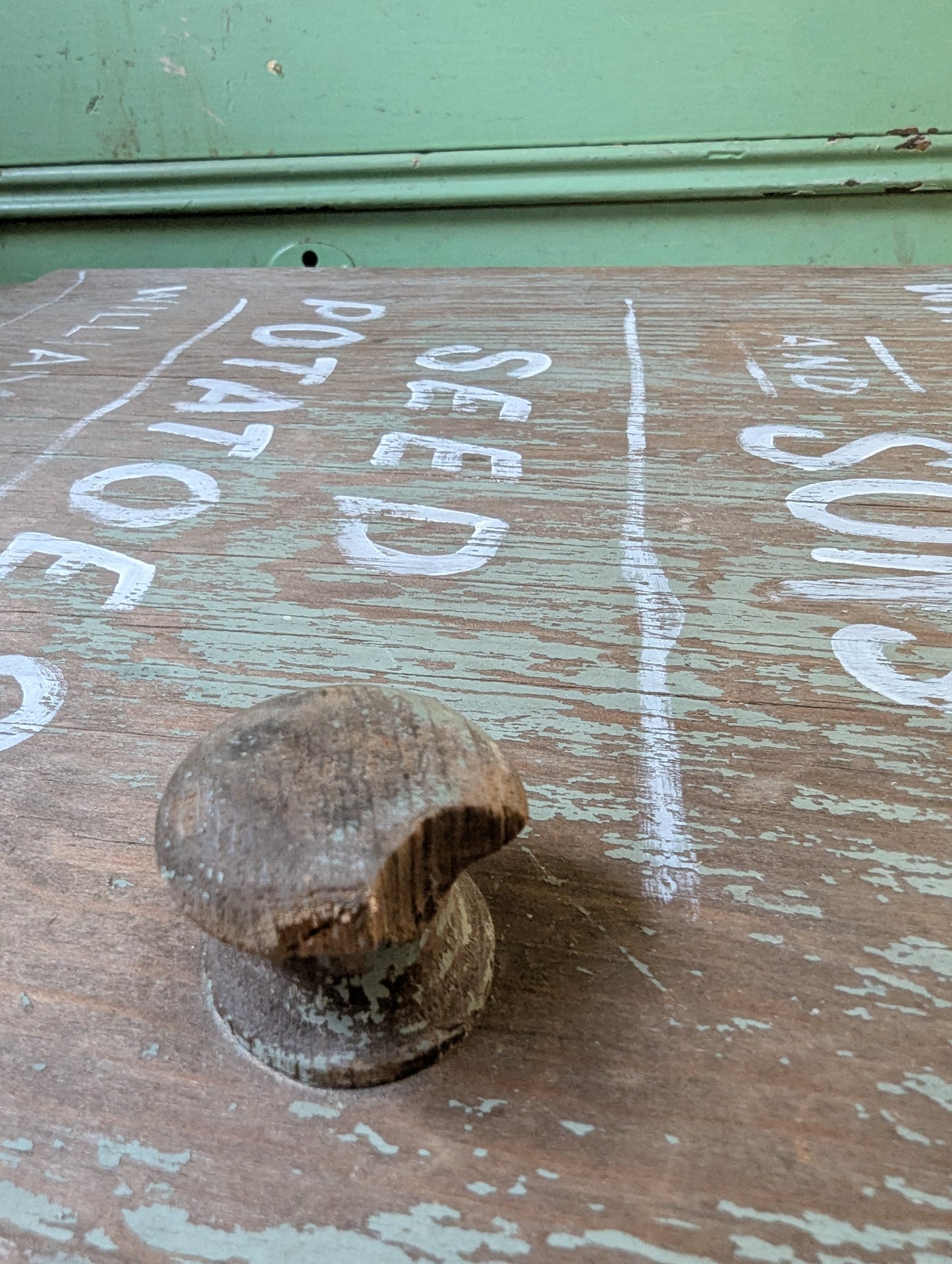 Wood door repurposed sign