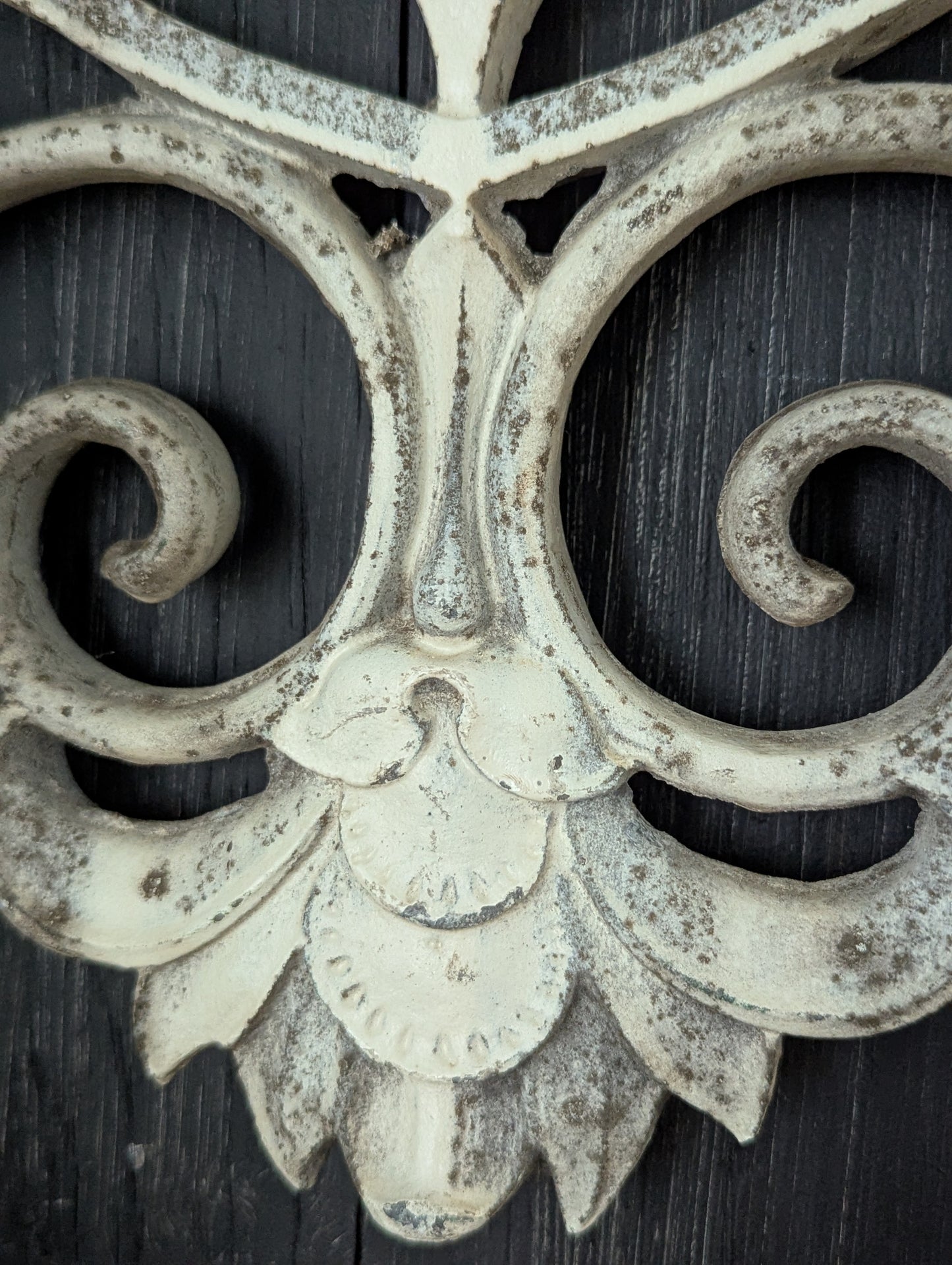 White cast metal wall decor