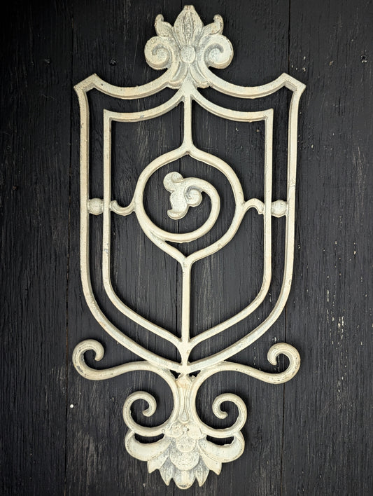 White cast metal wall decor