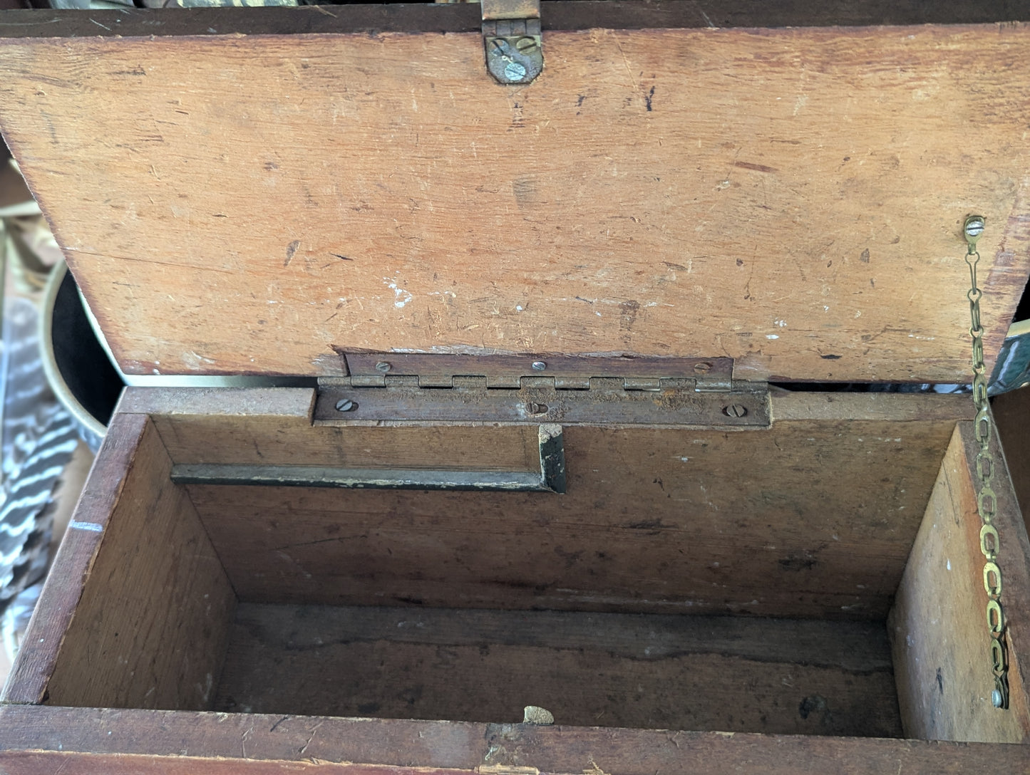 Vintage wooden box with hinged lid