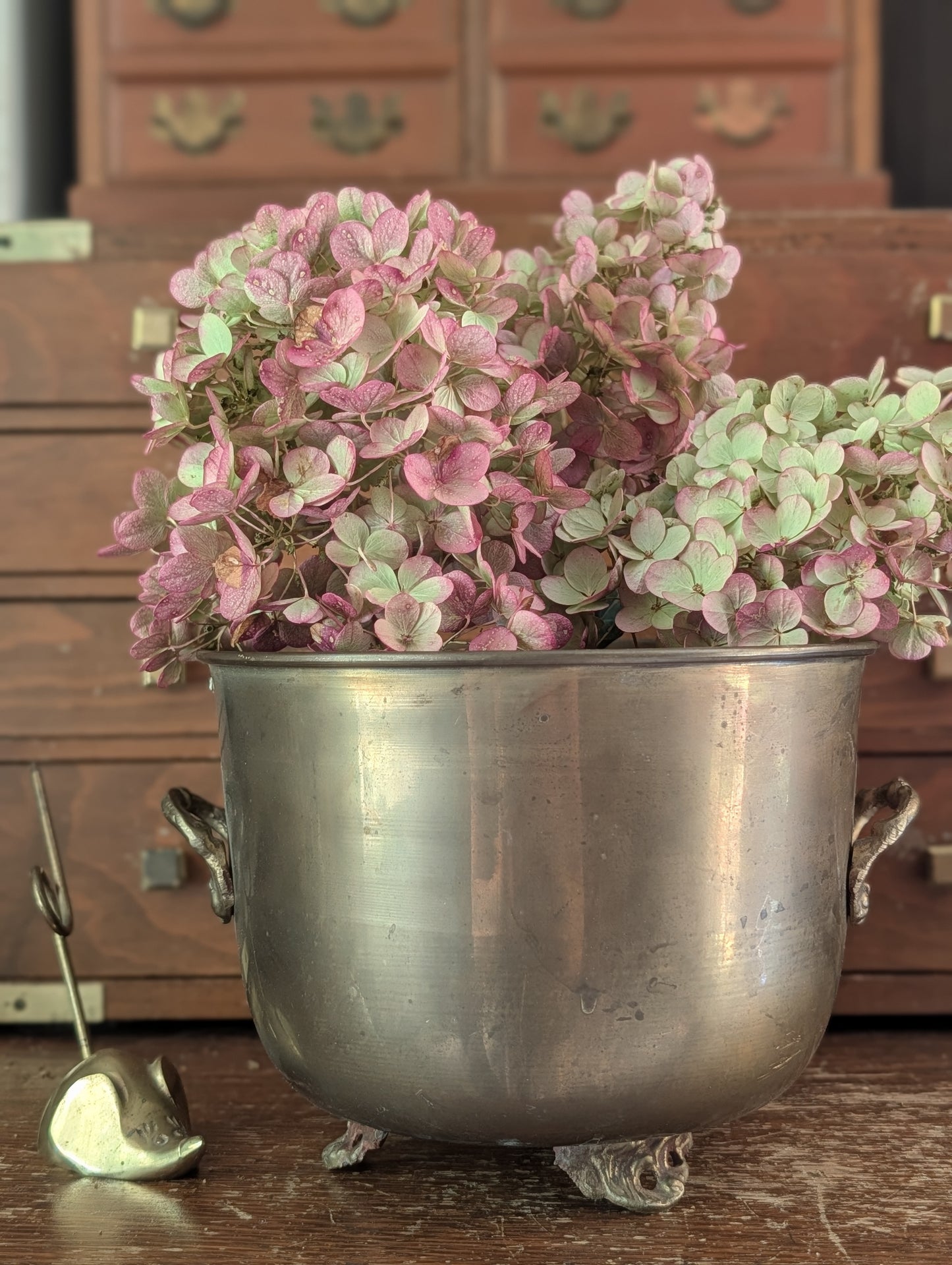 Brass footed pot