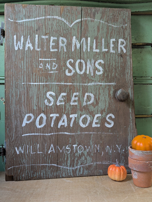 Wood door repurposed sign