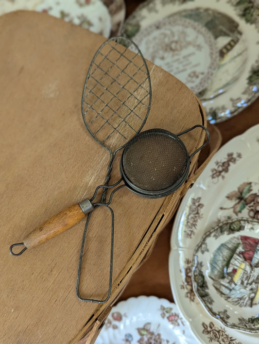 Kitchen gadgets whisk and strainer