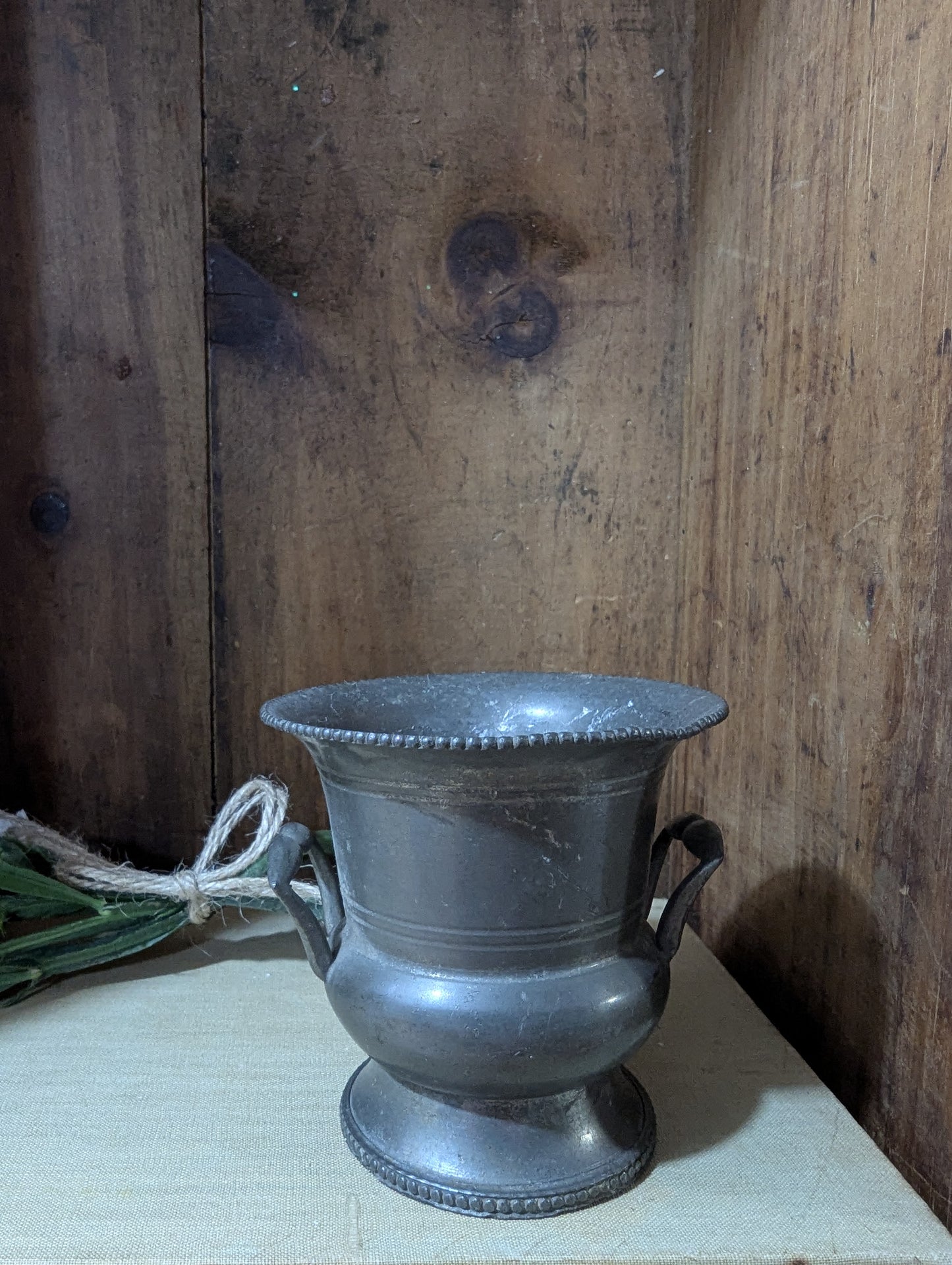 Set of two pewter urns