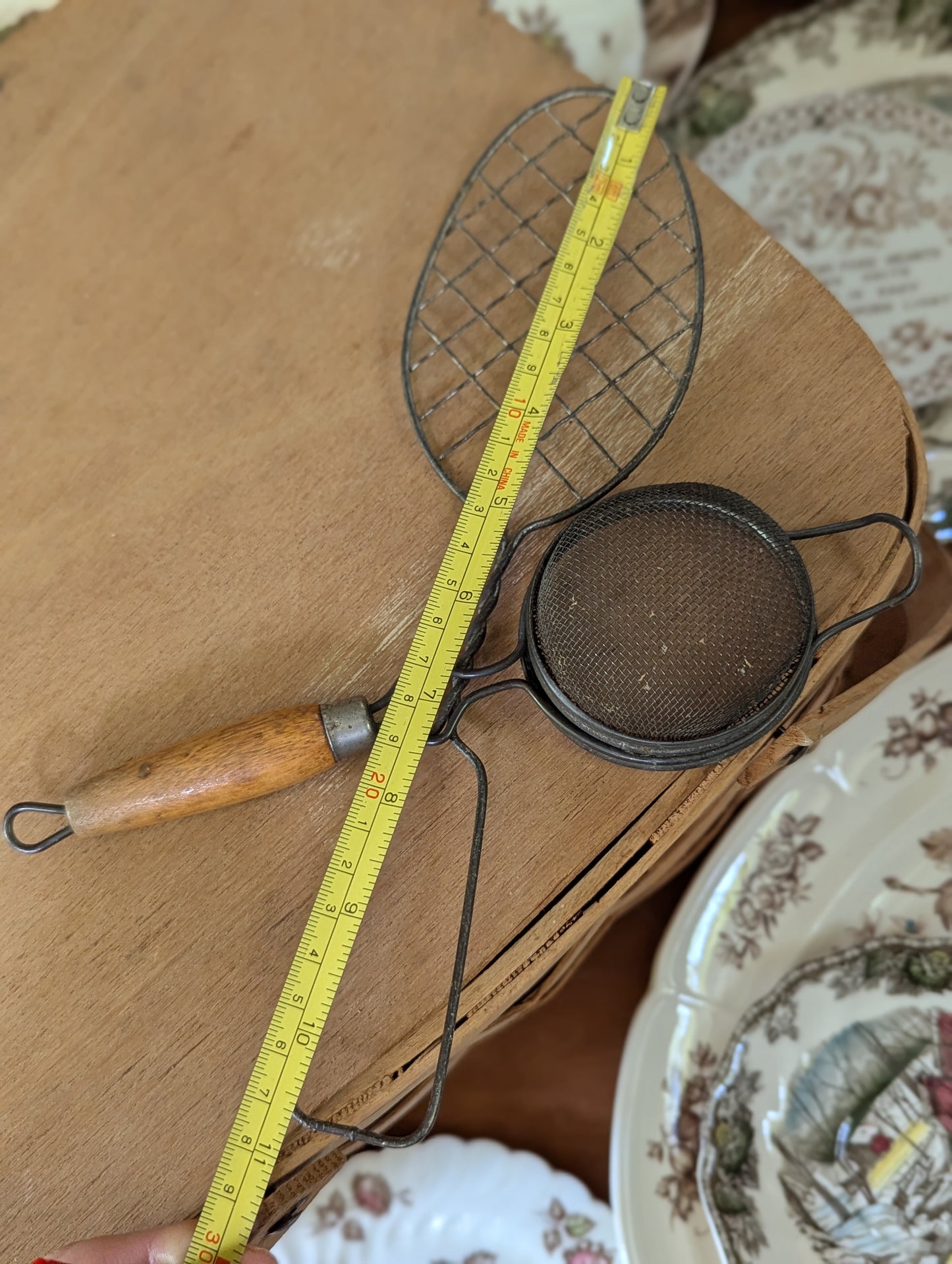 Kitchen gadgets whisk and strainer