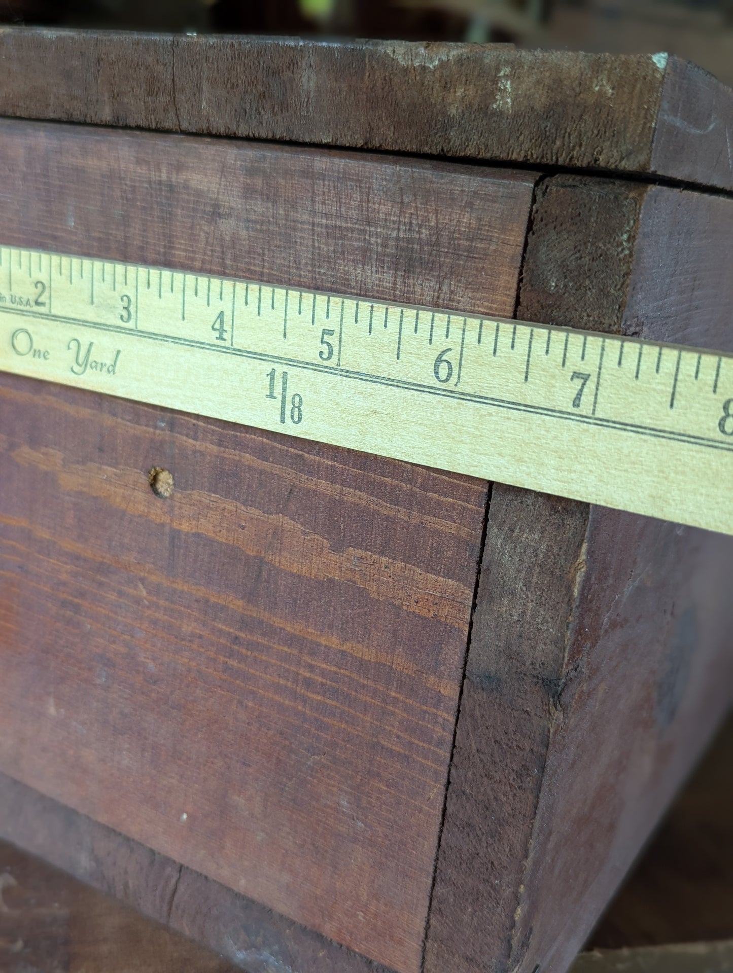 Vintage wooden box with hinged lid