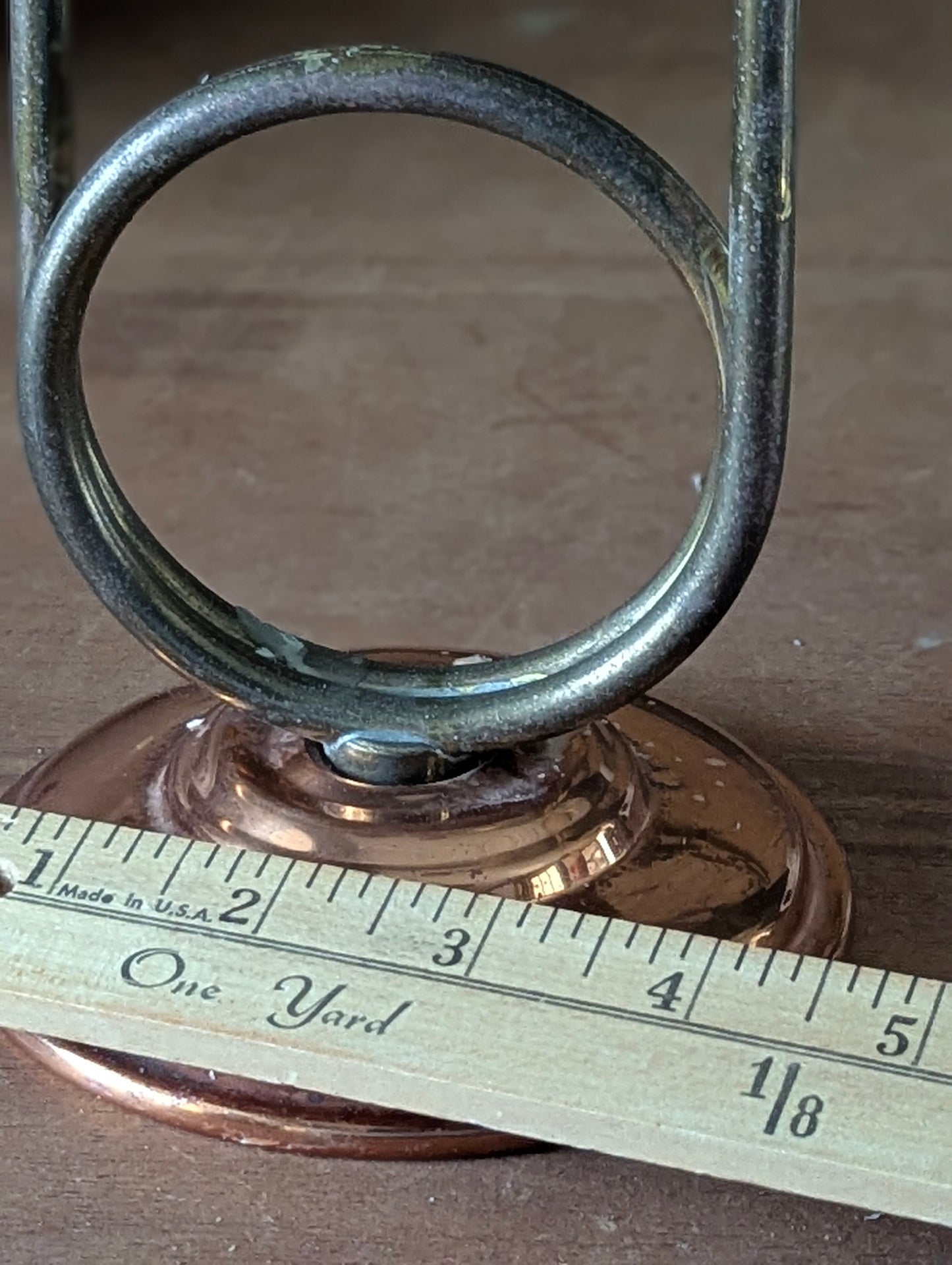 Double looped brass candlestick holder