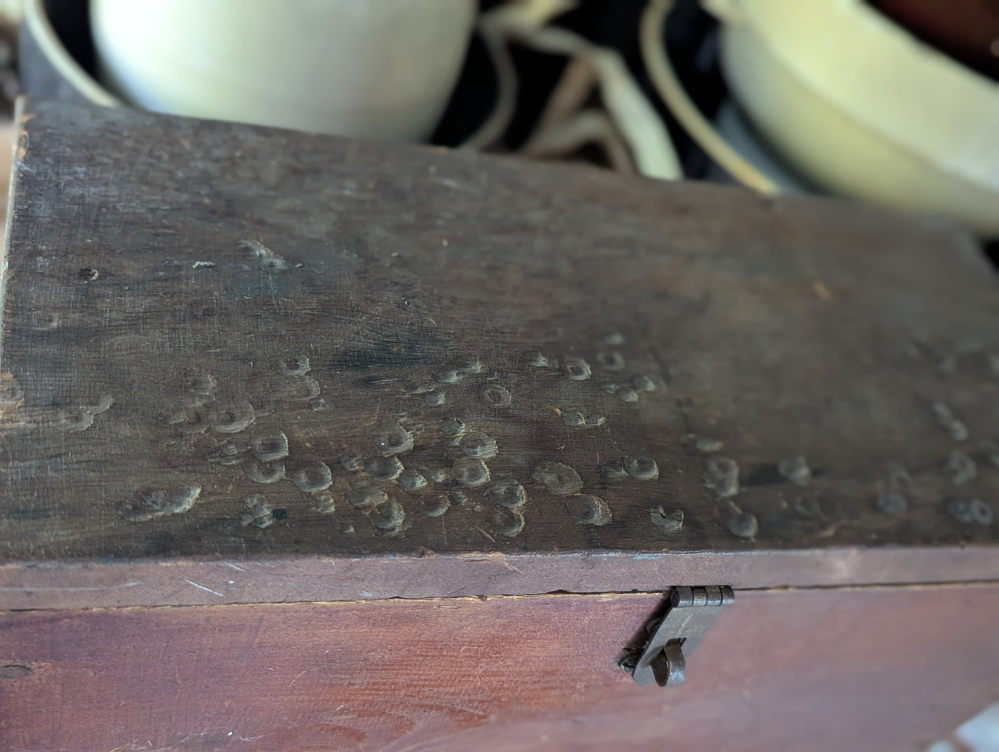 Vintage wooden box with hinged lid