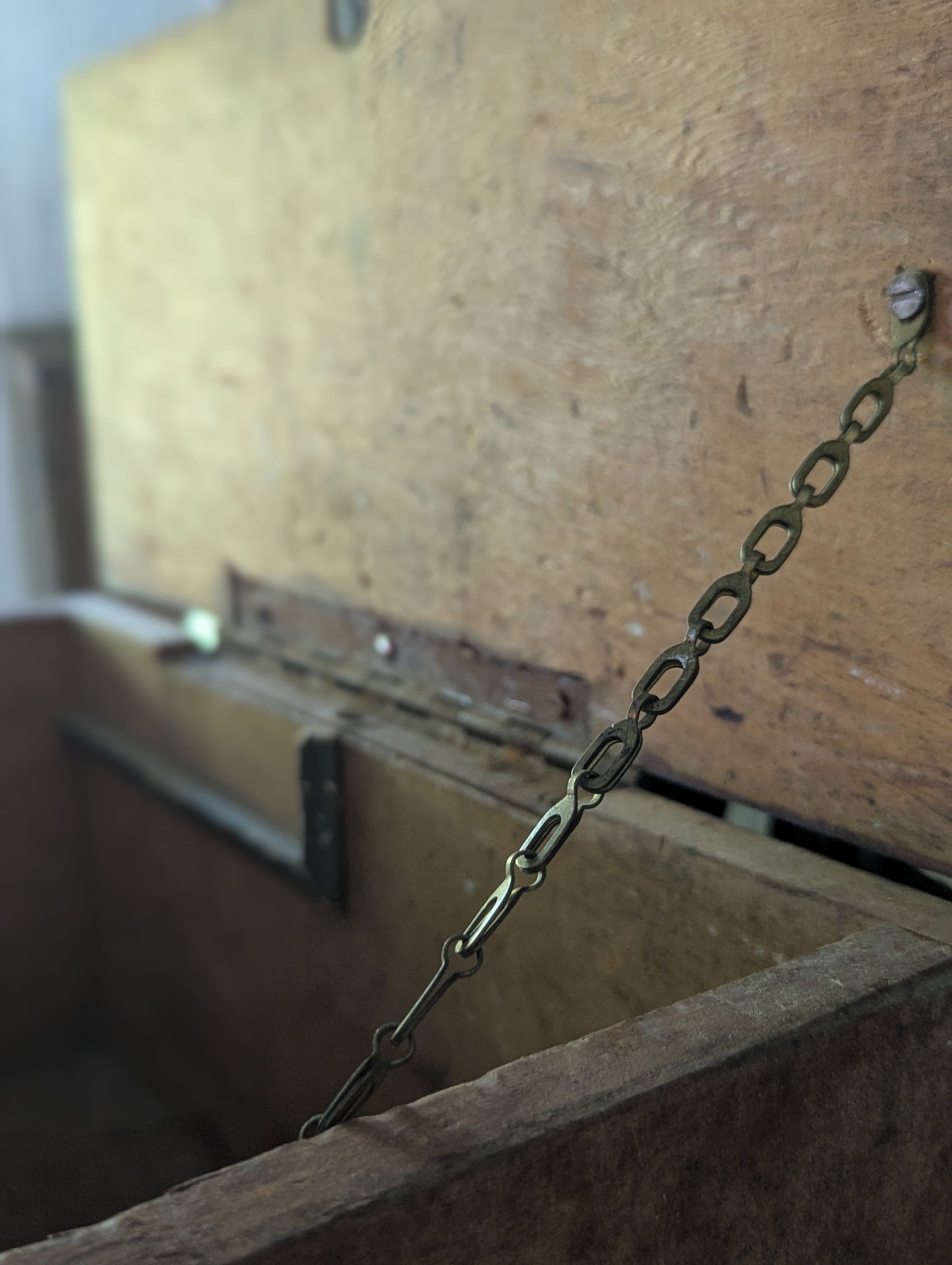 Vintage wooden box with hinged lid