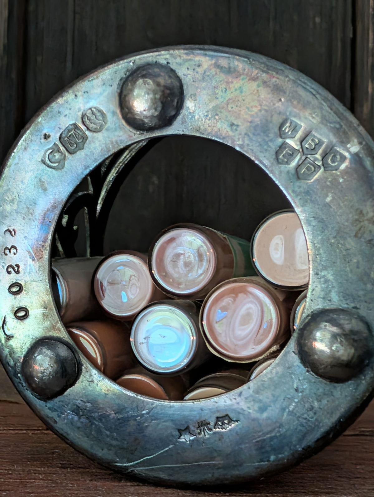 Silver plate cup with pigments
