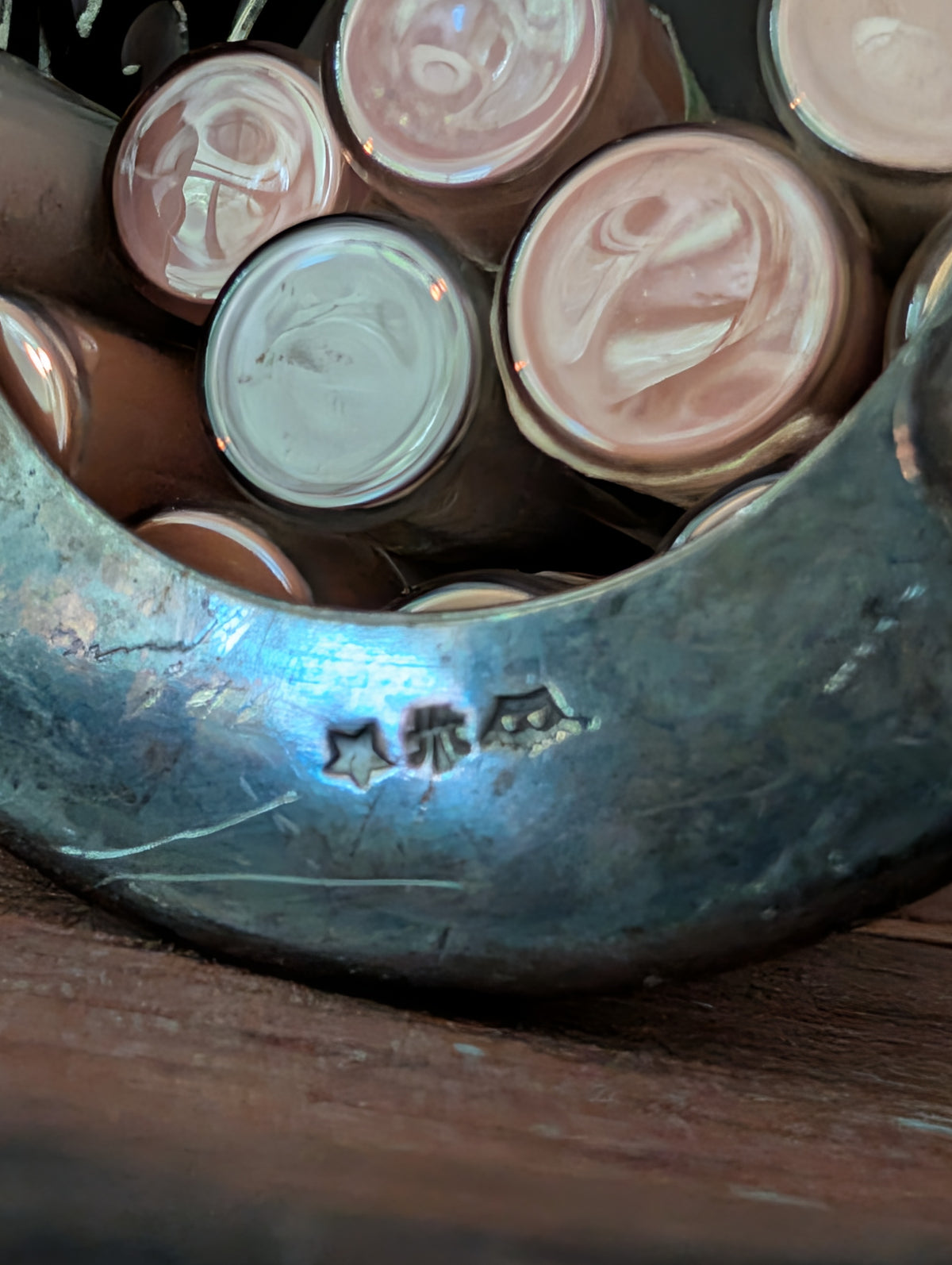 Silver plate cup with pigments