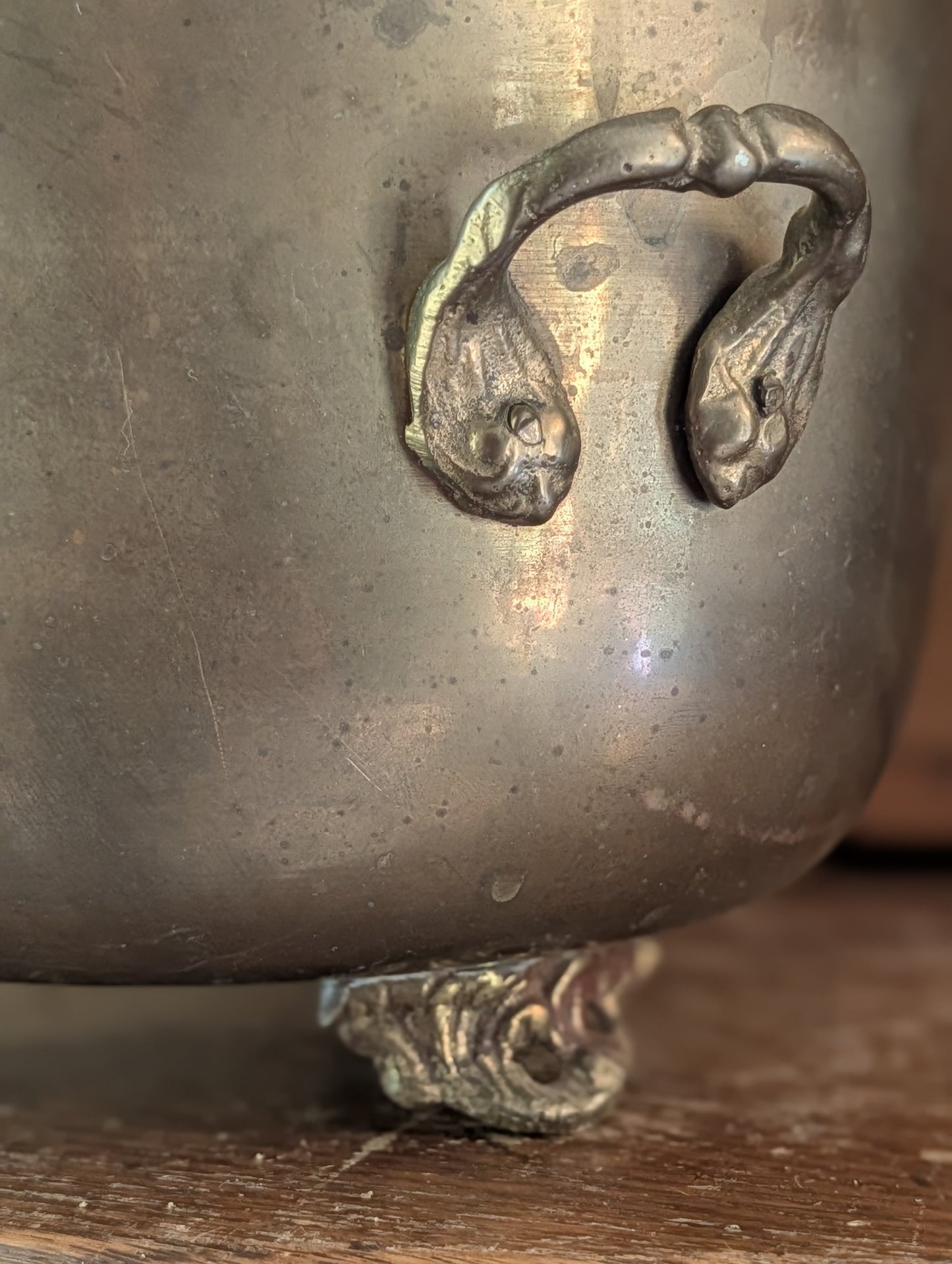 Brass footed pot