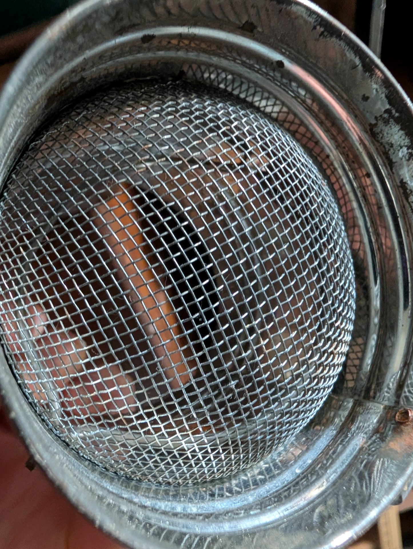 Pair of metal sifters