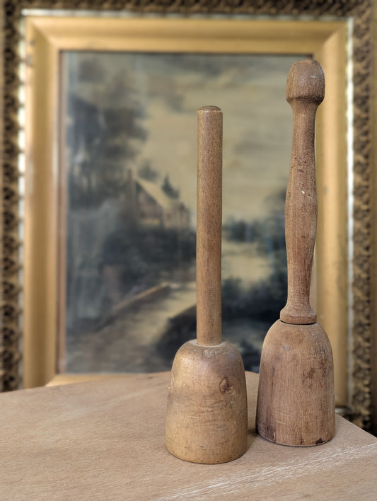 Pair of wood potato mashers
