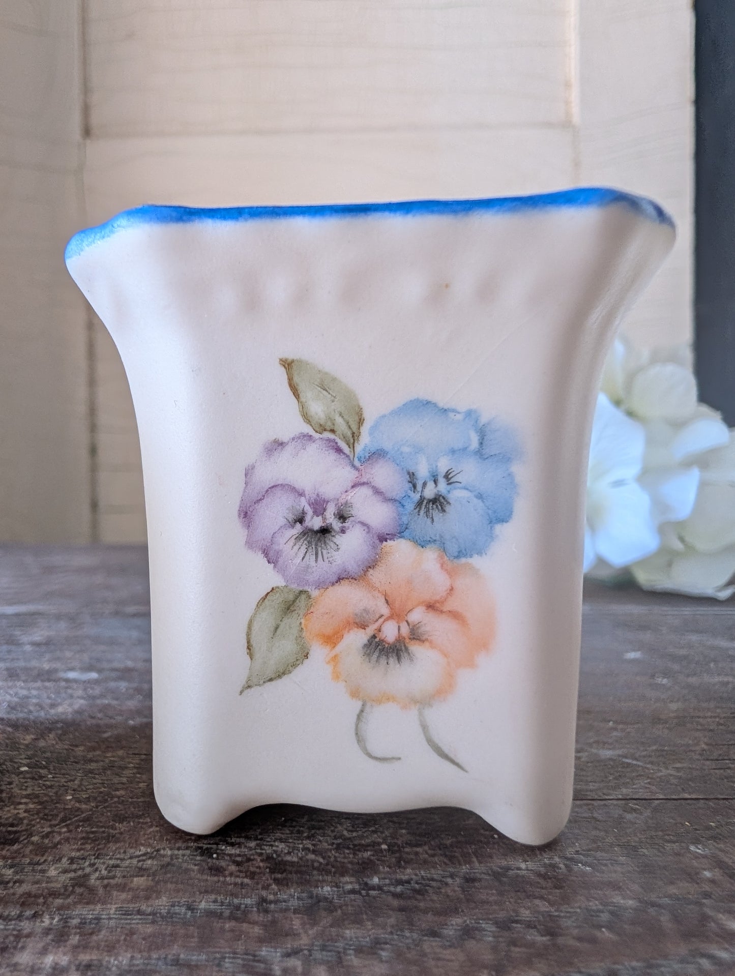 Mini pot with bluebird egg
