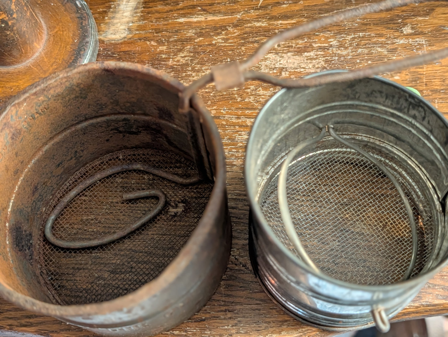 Pair of metal sifters