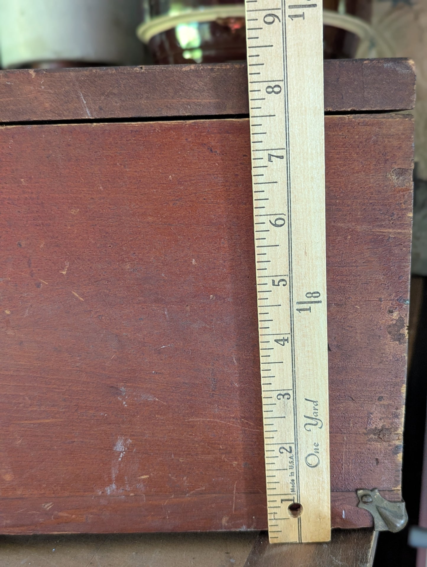 Vintage wooden box with hinged lid