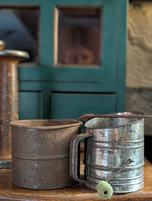 Pair of metal sifters