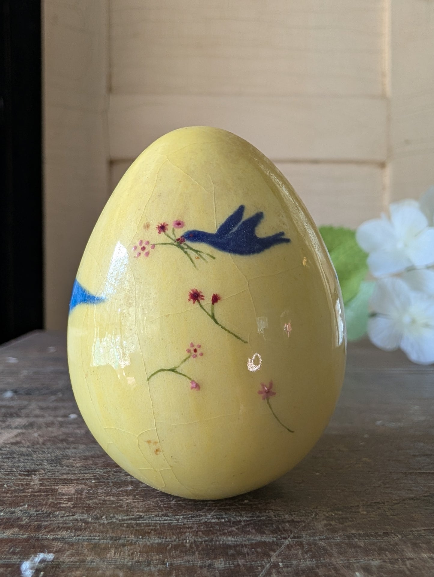 Mini pot with bluebird egg
