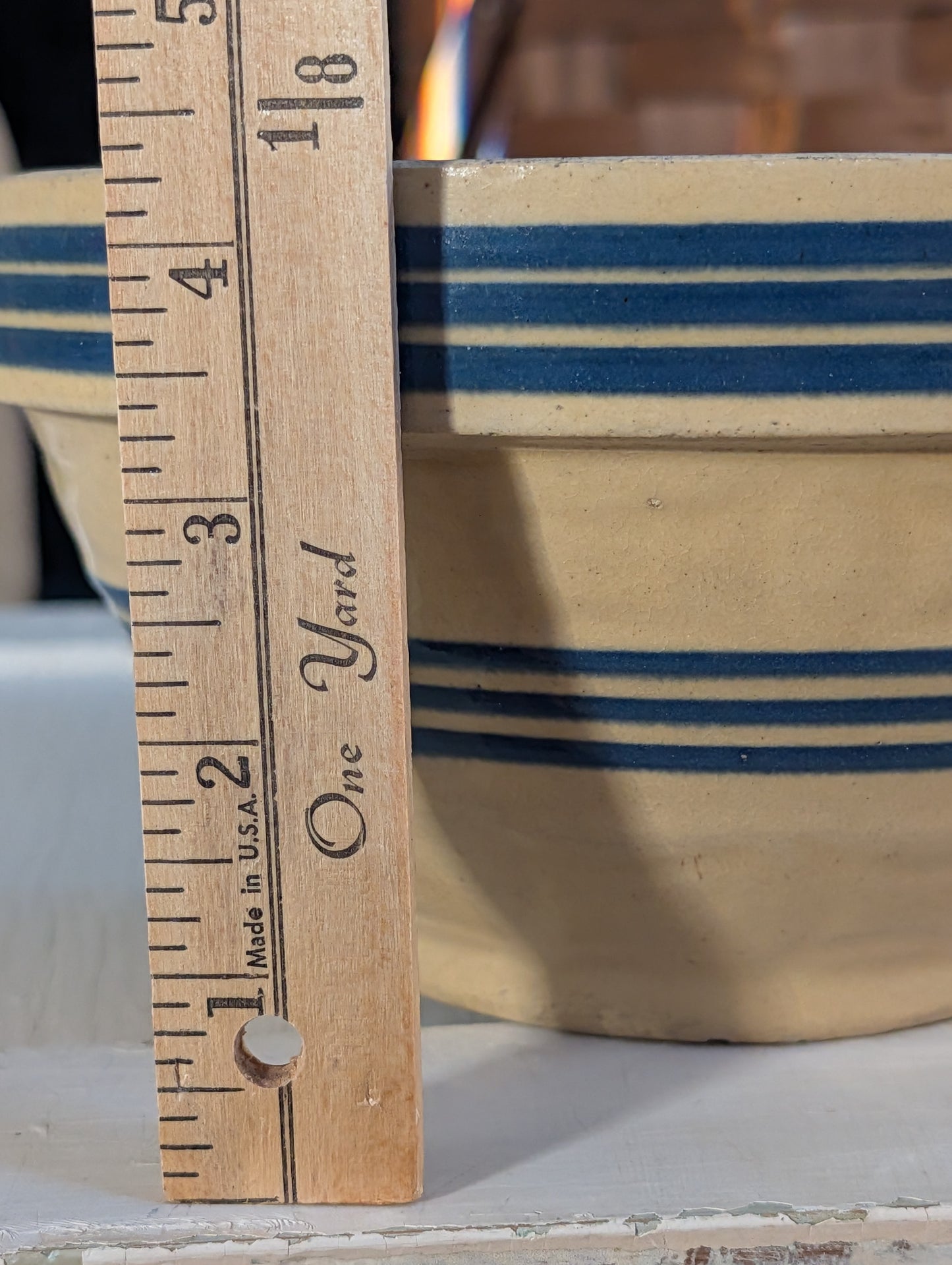 Yellow ware blue striped mixing bowl