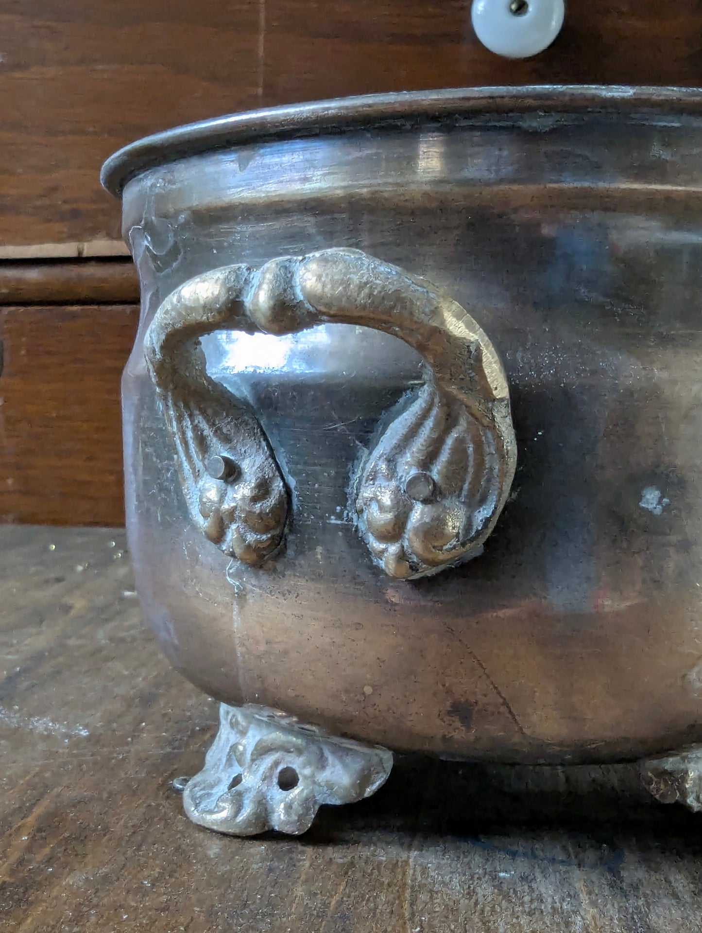 Brass footed planter pot