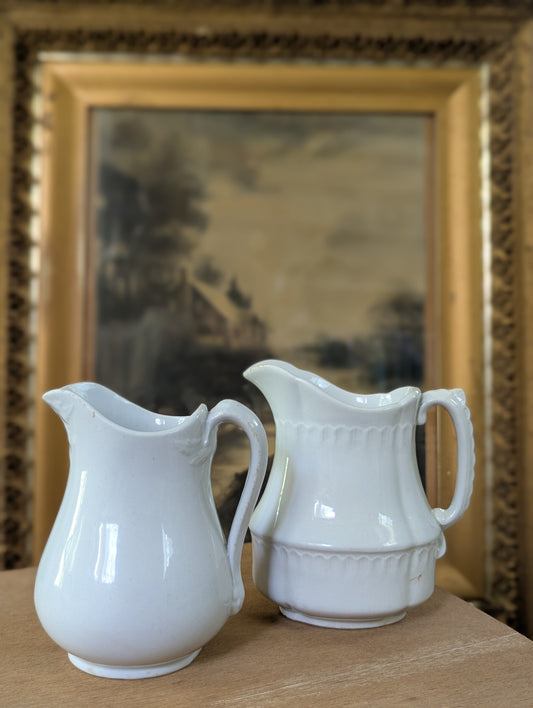 Pair of ironstone pitchers/creamers